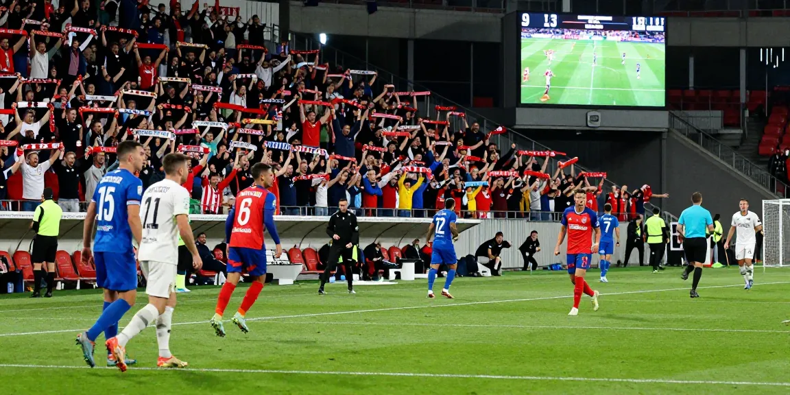 Live football action showcasing the excitement of https://footballstandings.tv/ at Puskás Aréna with fans and players.